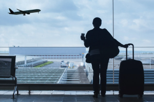 person waiting for plane at airport