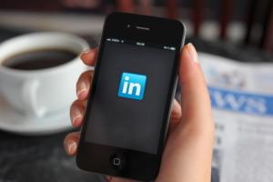 iPhone with LinkedIn logo