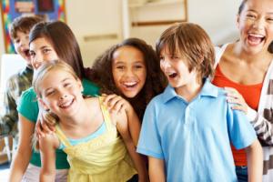 Children smiling and laughing.