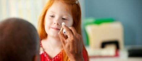 young girl with pink eye